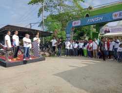 HUT BUMN ke-25, Warga Konawe Tumpah Ruah di Jalan Sehat ‘Estafet Obor BUMN’
