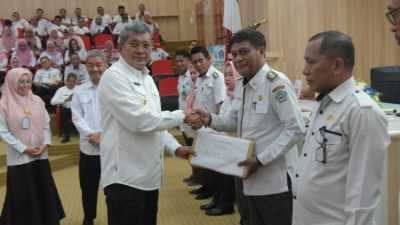 Pemkot Kendari Serahkan 128.611 Lembar SPPT PBB-P2 Senilai Rp28 Miliar