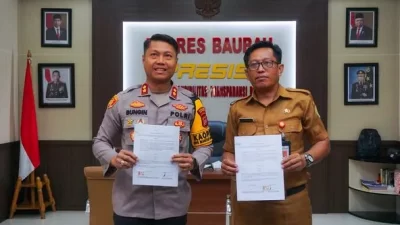 Polres Baubau dan Disdukcapil Teken MoU Penggunaan e-SKTLK